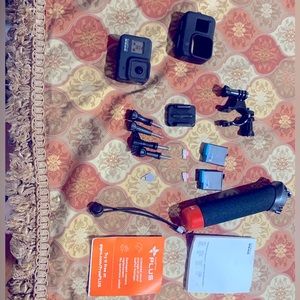 Go pro 8 black 3 SIM card and also 3 battery  and it includes accessories to